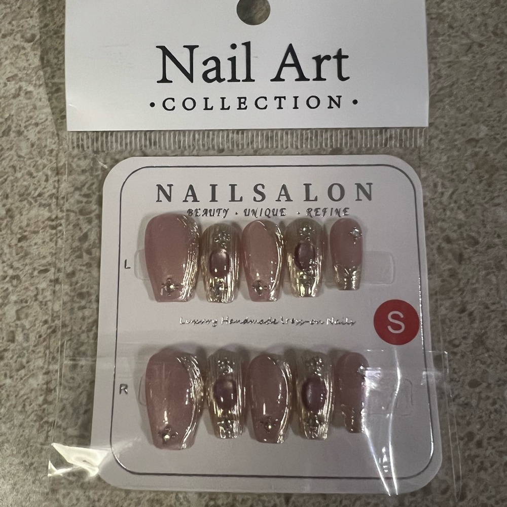 Press on nails. Gold and pink!